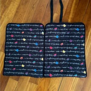 American Girl sleeping bag for doll and Coco the dog.